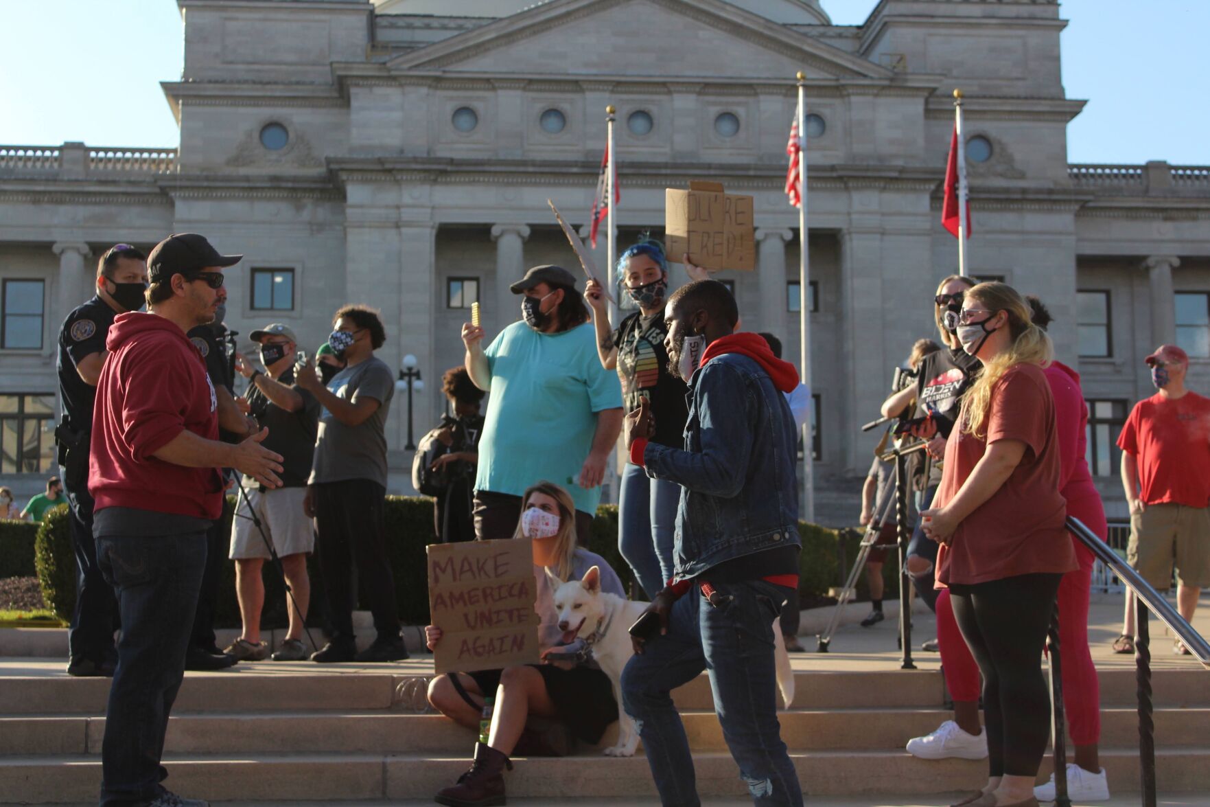 Demonstrators debate on the steps of the Capitol